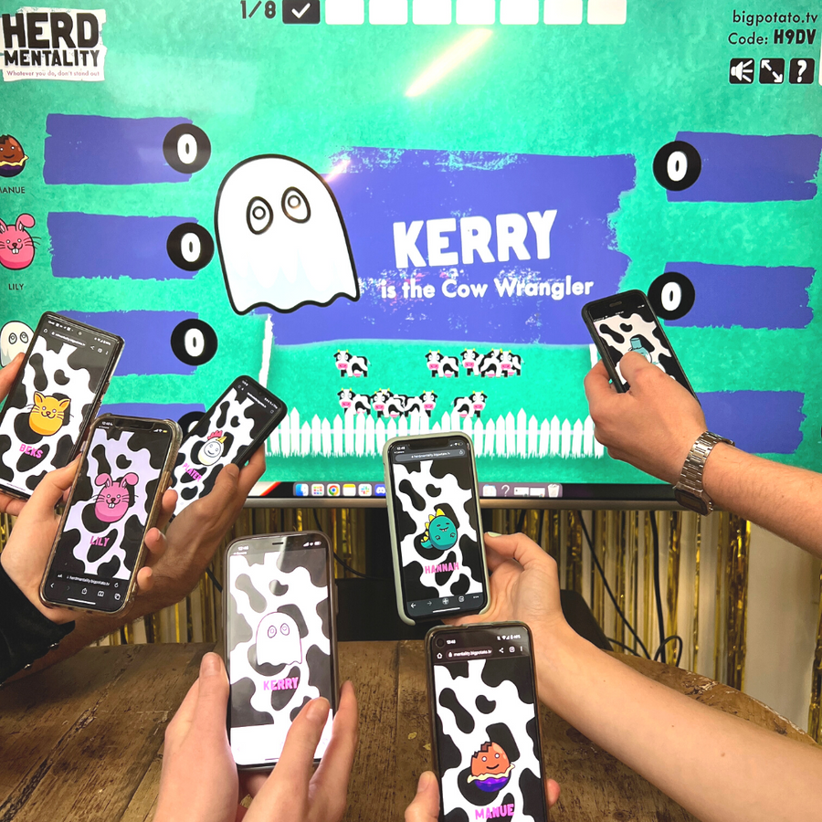 People playing Game City showing their phones