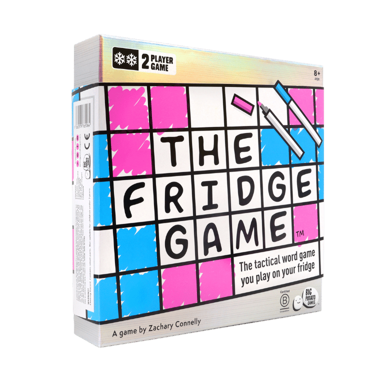 The Fridge Game board game box, featuring a colorful grid design in pink, blue, and white with black lettering, plus illustrations of markers.