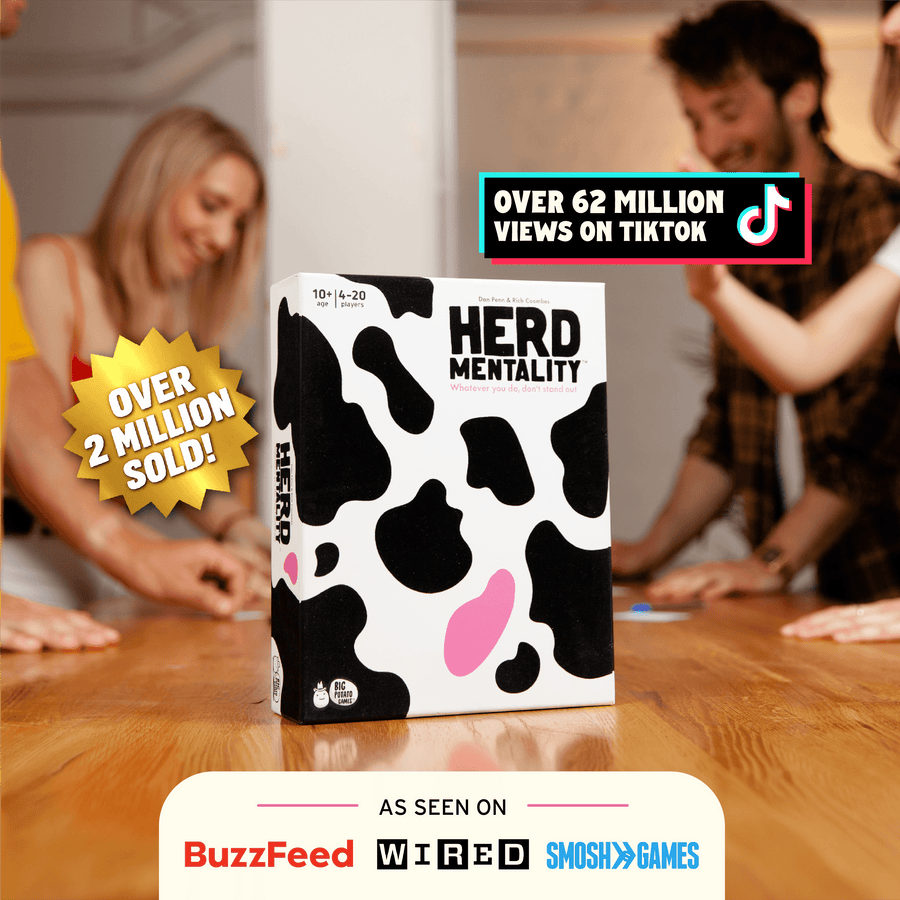 Herd Mentality game on a table with people playing in the background. Flashes on the image highlight: over 2 million sold, over 62 million views on tiktok and "as seen on" buzzfeed, wired and smosh games.