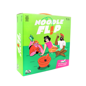 The Noodle Flip game box is shown against a black background, with bright green packaging and illustrated players lounging on grass while flipping orange foam noodles into a target bowl.